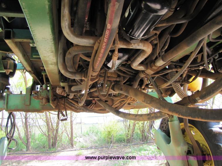 image for item 6908 1998 John Deere 4700 sprayer with 90' boom