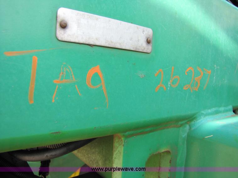 image for item 6908 1998 John Deere 4700 sprayer with 90' boom