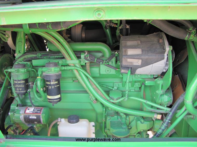 image for item 6910 2004 John Deere 7460 cotton stripper