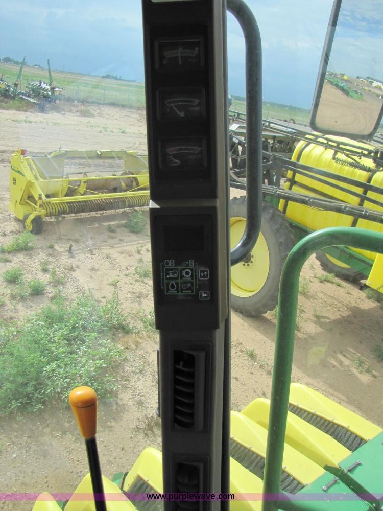 image for item 6910 2004 John Deere 7460 cotton stripper