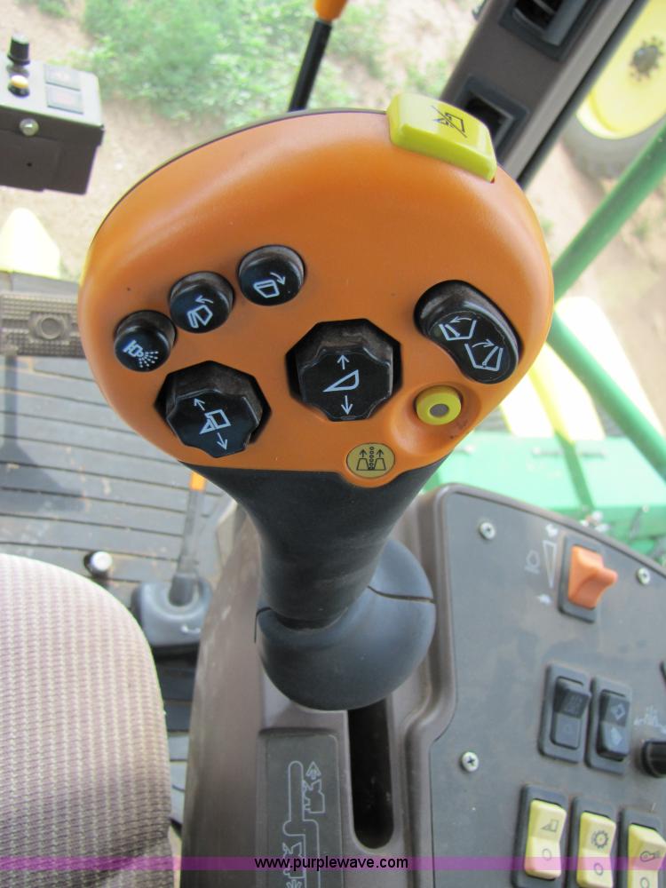 image for item 6910 2004 John Deere 7460 cotton stripper