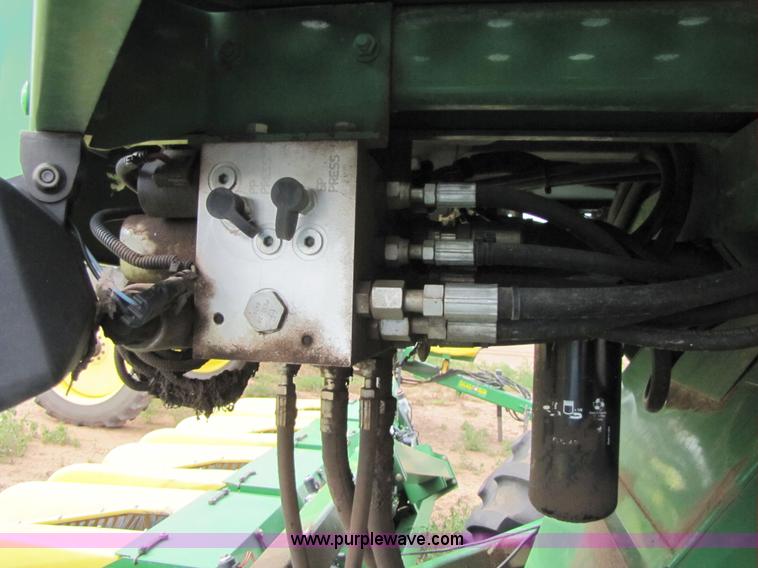 image for item 6910 2004 John Deere 7460 cotton stripper