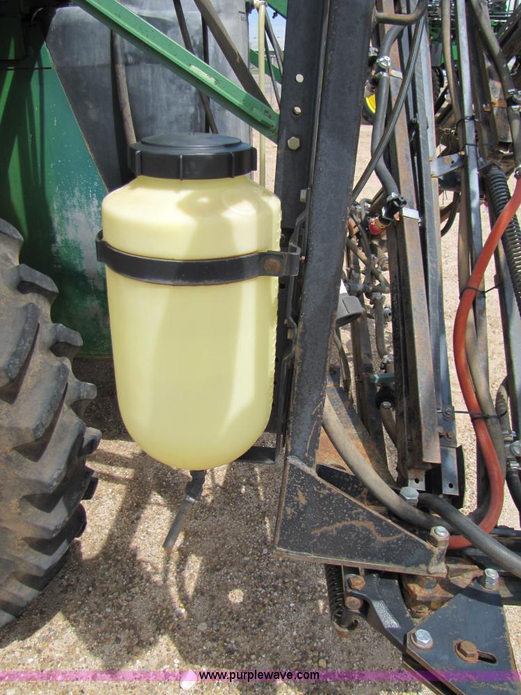 image for item 6915 1995 John Deere 6500 self-propelled Hi-Cycle sprayer