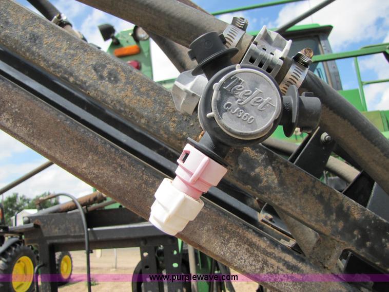 image for item 6915 1995 John Deere 6500 self-propelled Hi-Cycle sprayer