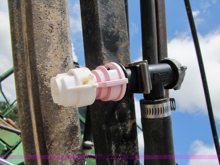 image for item 6915 1995 John Deere 6500 self-propelled Hi-Cycle sprayer