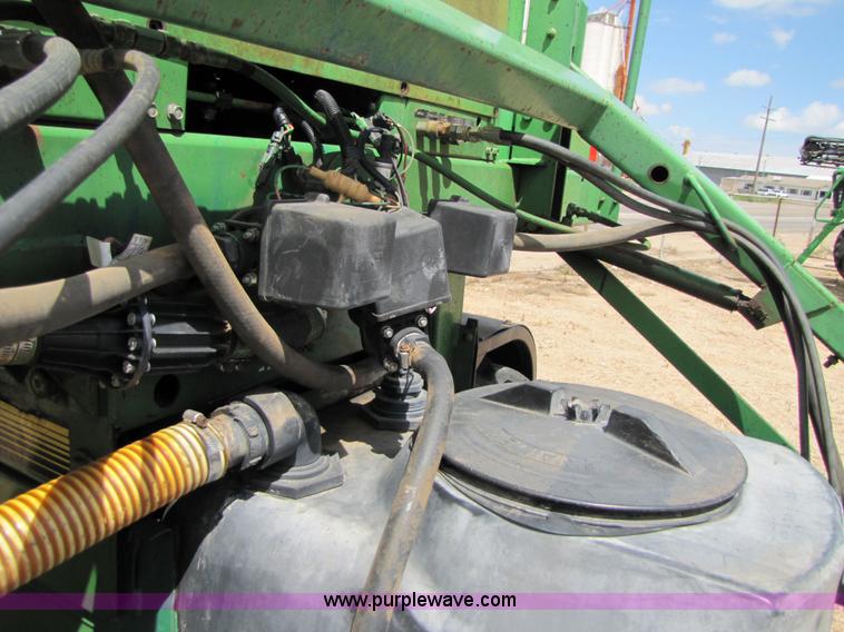 image for item 6915 1995 John Deere 6500 self-propelled Hi-Cycle sprayer