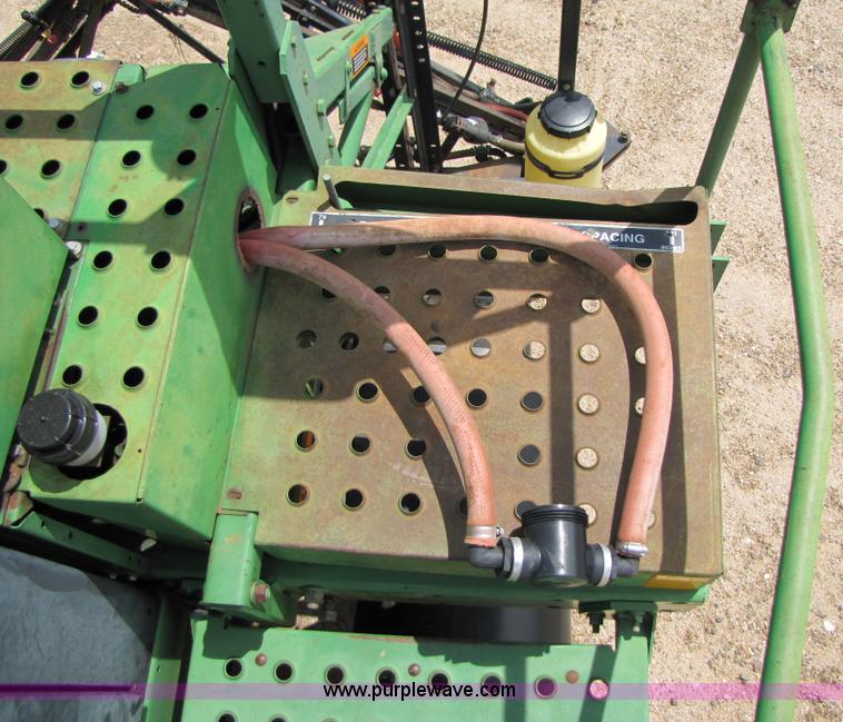 image for item 6915 1995 John Deere 6500 self-propelled Hi-Cycle sprayer