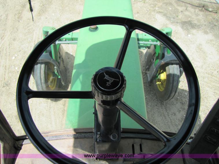 image for item 6915 1995 John Deere 6500 self-propelled Hi-Cycle sprayer