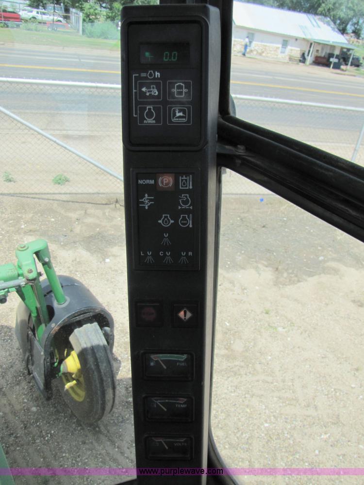 image for item 6915 1995 John Deere 6500 self-propelled Hi-Cycle sprayer