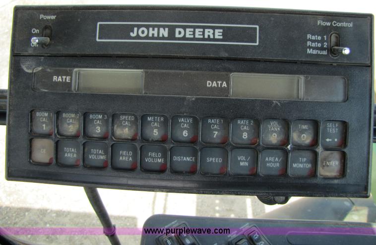 image for item 6915 1995 John Deere 6500 self-propelled Hi-Cycle sprayer