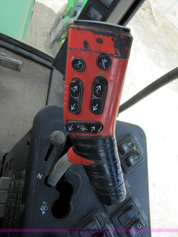 image for item 6915 1995 John Deere 6500 self-propelled Hi-Cycle sprayer