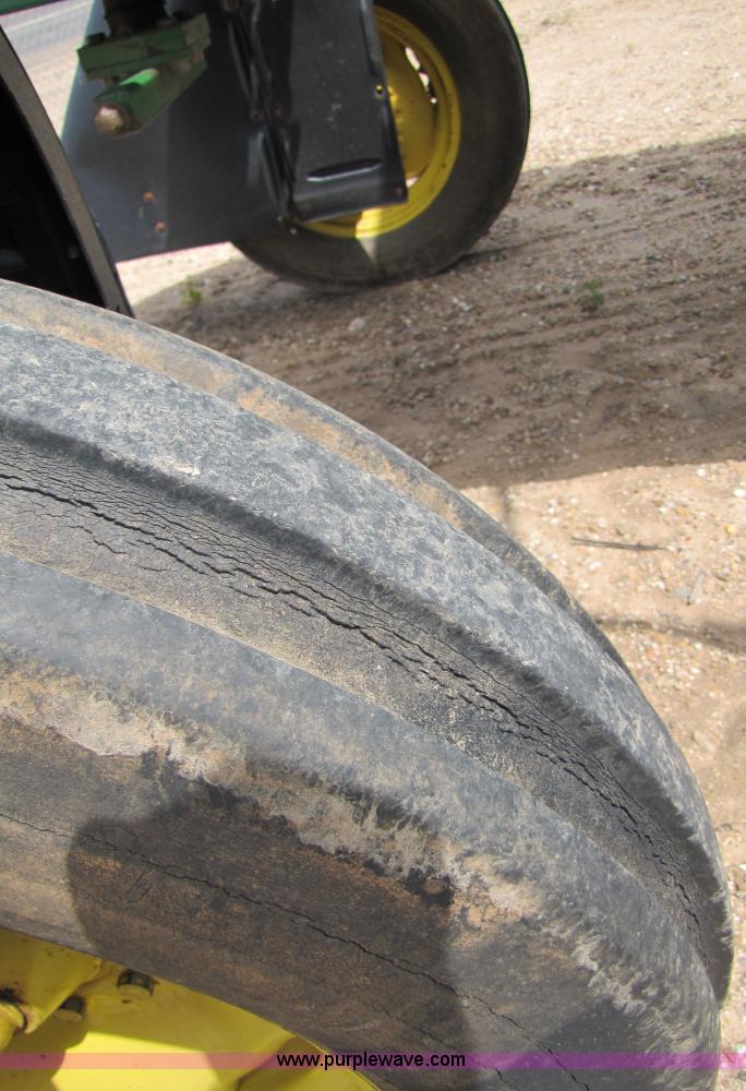 image for item 6915 1995 John Deere 6500 self-propelled Hi-Cycle sprayer