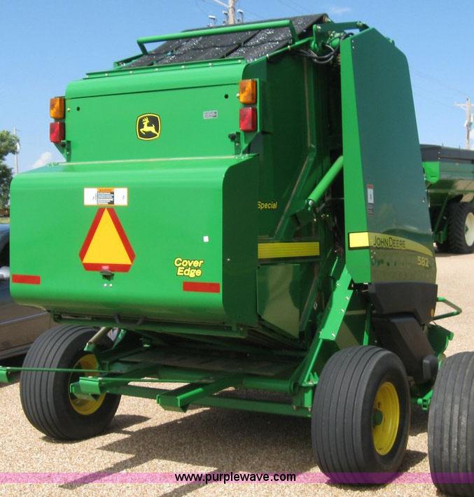 image for item 6933 2008 John Deere 582 silage special round baler