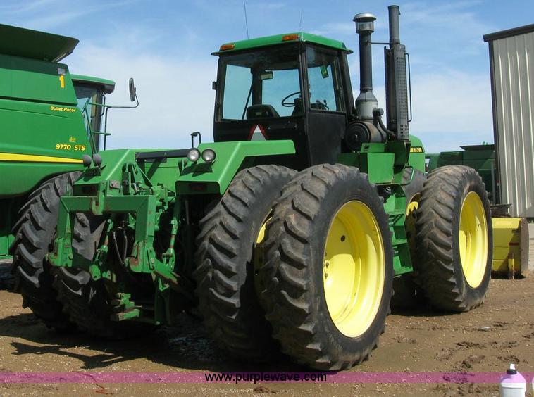 image for item 6963 1991 John Deere 8760 4WD tractor with blade