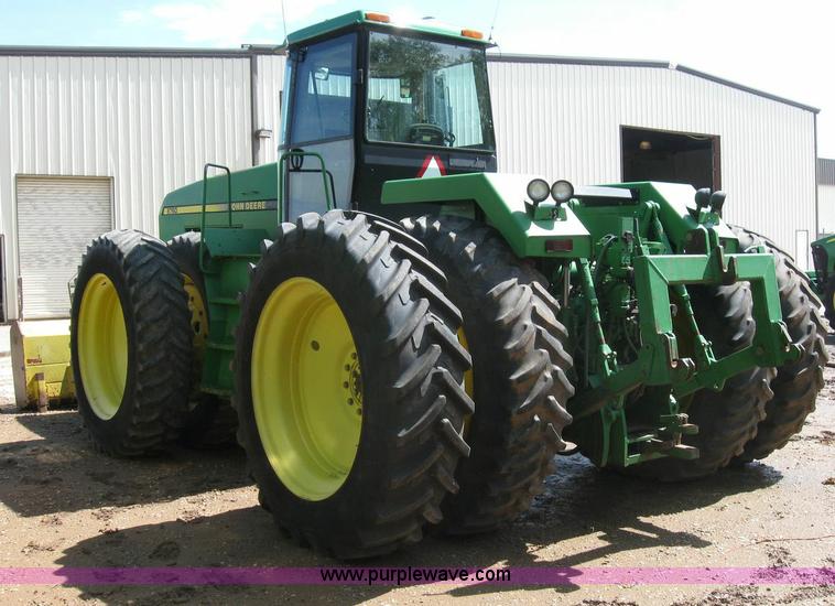 image for item 6963 1991 John Deere 8760 4WD tractor with blade