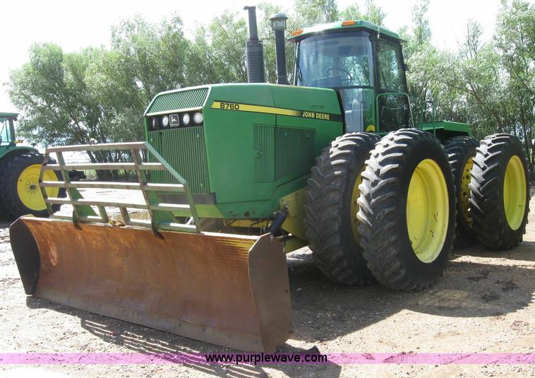 image for item 6963 1991 John Deere 8760 4WD tractor with blade