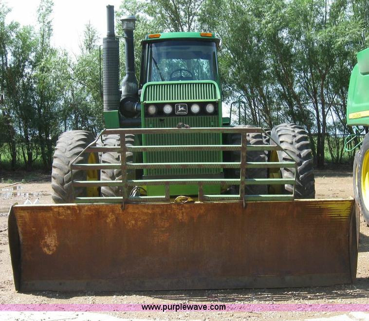 image for item 6963 1991 John Deere 8760 4WD tractor with blade