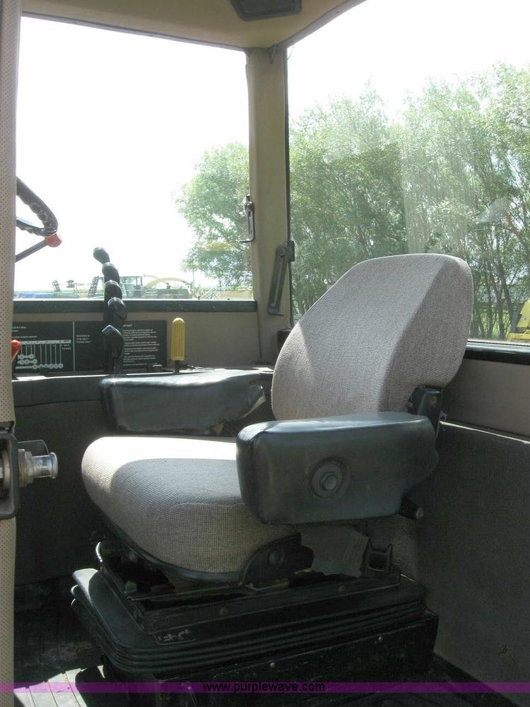 image for item 6963 1991 John Deere 8760 4WD tractor with blade