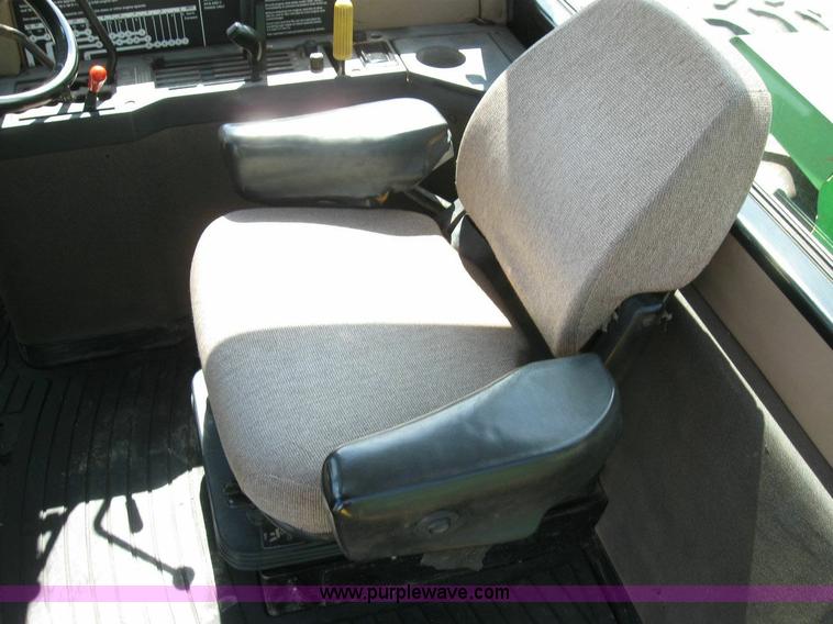 image for item 6963 1991 John Deere 8760 4WD tractor with blade