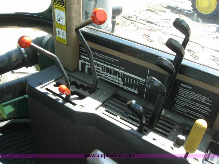 image for item 6963 1991 John Deere 8760 4WD tractor with blade