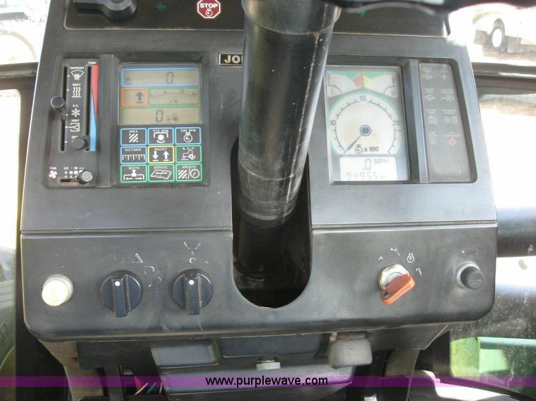 image for item 6963 1991 John Deere 8760 4WD tractor with blade