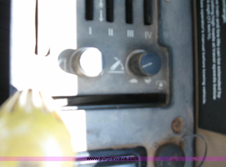 image for item 6963 1991 John Deere 8760 4WD tractor with blade