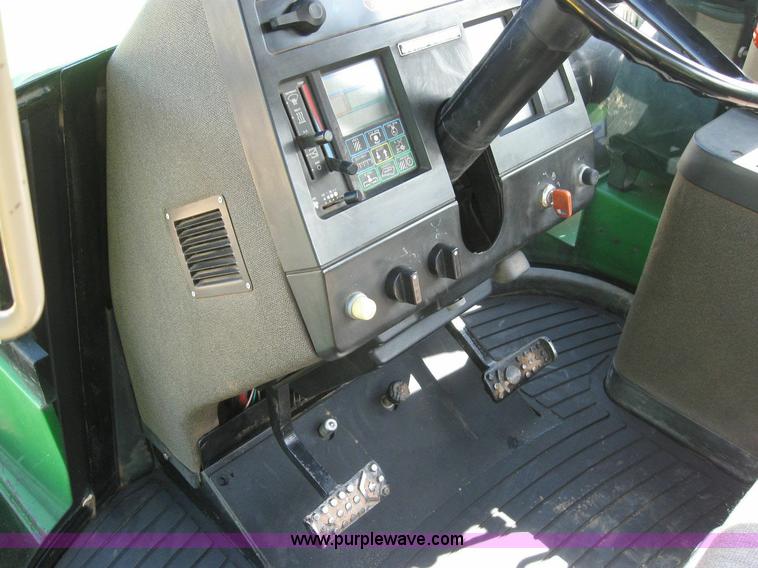 image for item 6963 1991 John Deere 8760 4WD tractor with blade