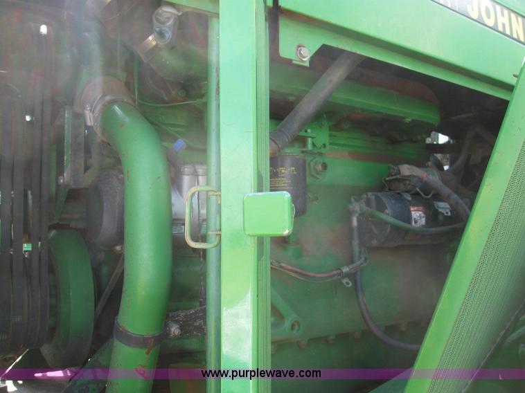 image for item 6963 1991 John Deere 8760 4WD tractor with blade