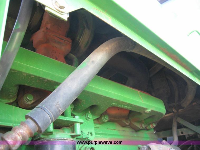 image for item 6963 1991 John Deere 8760 4WD tractor with blade