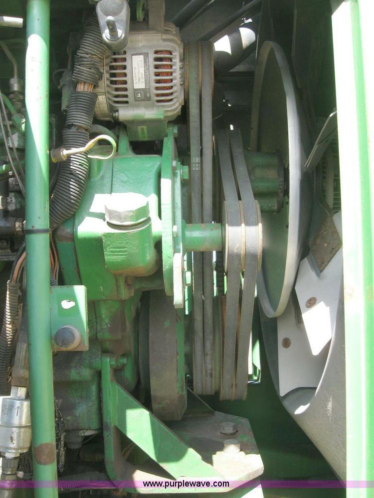 image for item 6963 1991 John Deere 8760 4WD tractor with blade