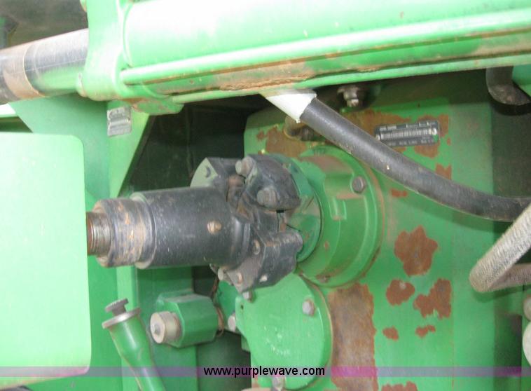 image for item 6963 1991 John Deere 8760 4WD tractor with blade