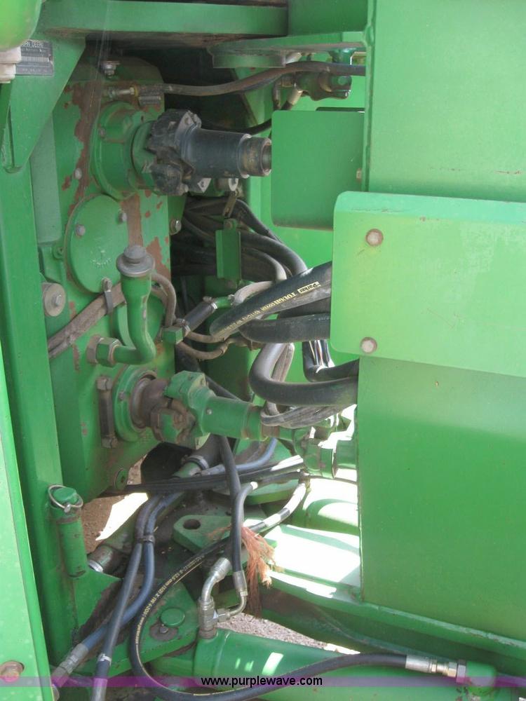 image for item 6963 1991 John Deere 8760 4WD tractor with blade