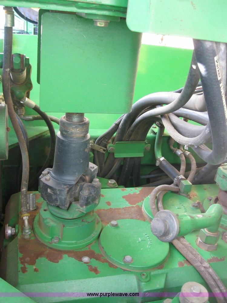 image for item 6963 1991 John Deere 8760 4WD tractor with blade