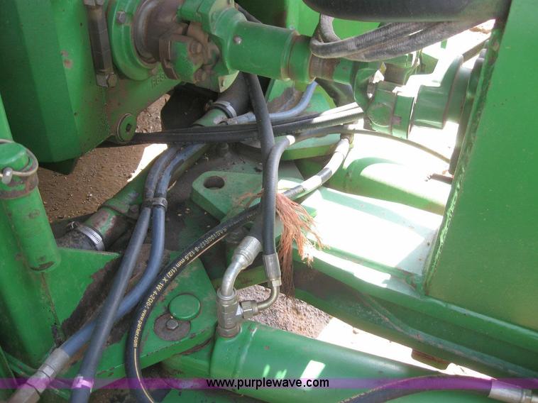 image for item 6963 1991 John Deere 8760 4WD tractor with blade