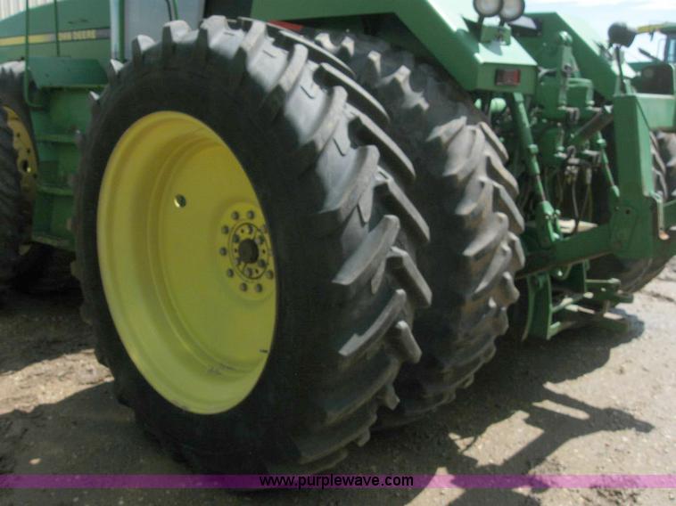 image for item 6963 1991 John Deere 8760 4WD tractor with blade