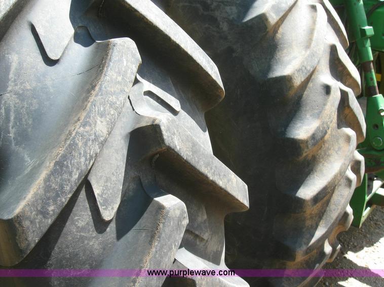 image for item 6963 1991 John Deere 8760 4WD tractor with blade