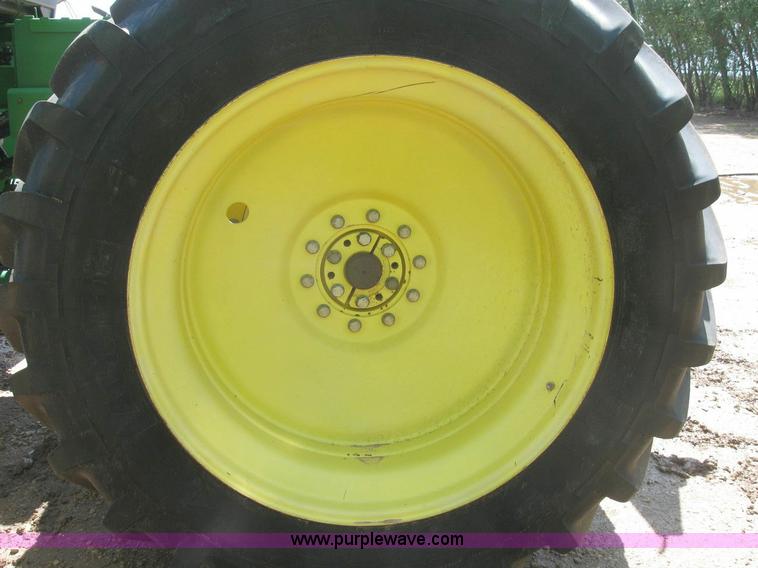 image for item 6963 1991 John Deere 8760 4WD tractor with blade