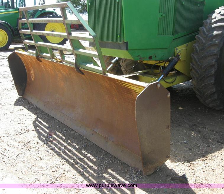 image for item 6963 1991 John Deere 8760 4WD tractor with blade