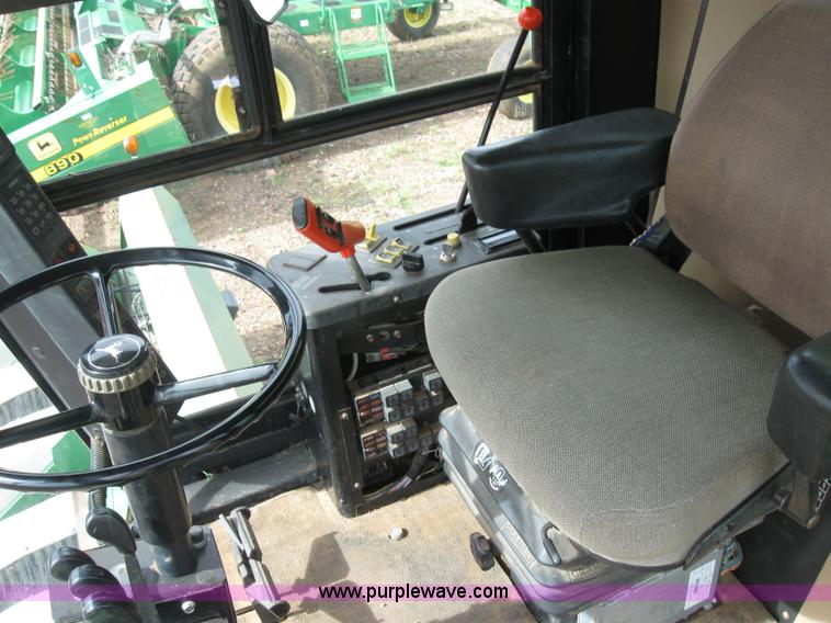 image for item 6968 1995 John Deere 7450 eight row cotton stripper