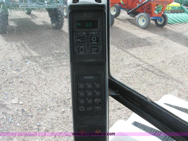 image for item 6968 1995 John Deere 7450 eight row cotton stripper