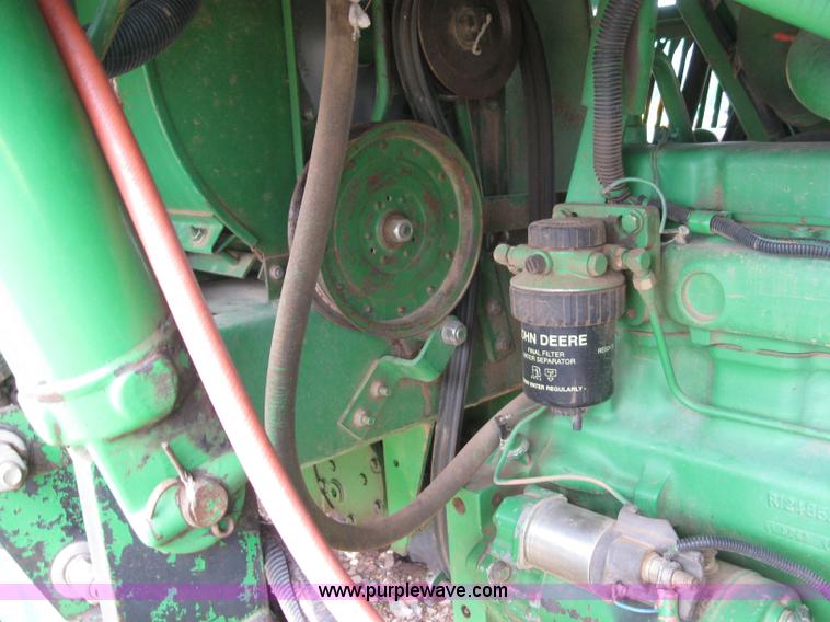 image for item 6968 1995 John Deere 7450 eight row cotton stripper
