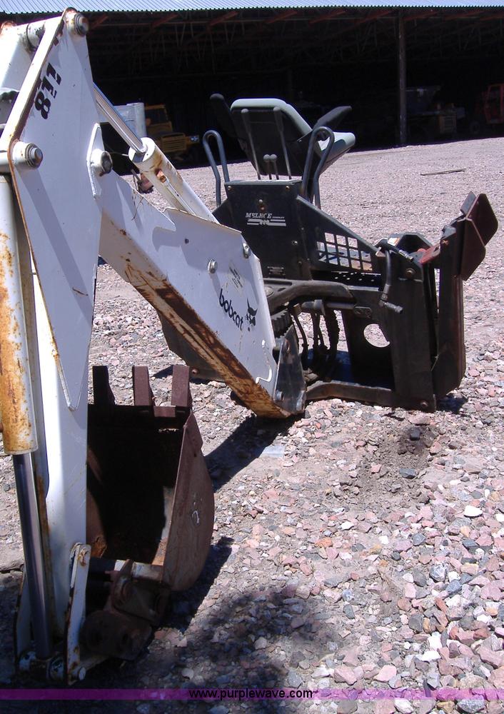 image for item 1001 Bobcat backhoe attachment