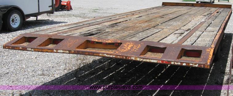 image for item 2124 1996 12 ton flat bed trailer