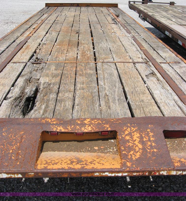 image for item 2124 1996 12 ton flat bed trailer