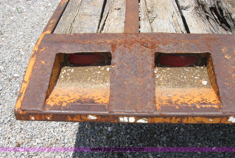 image for item 2124 1996 12 ton flat bed trailer