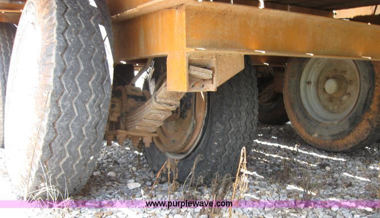 image for item 2124 1996 12 ton flat bed trailer