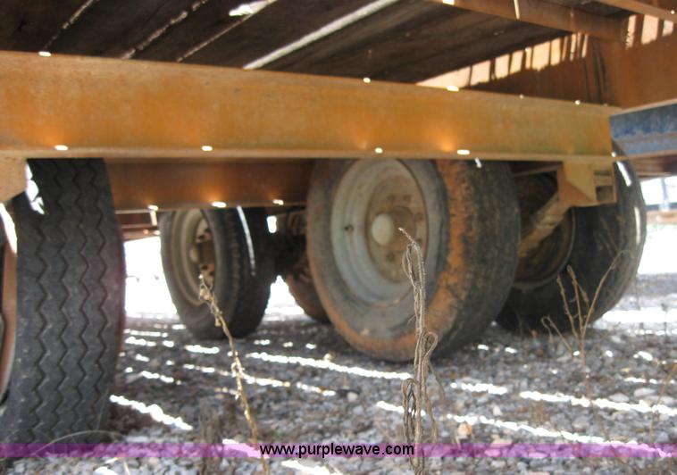 image for item 2124 1996 12 ton flat bed trailer