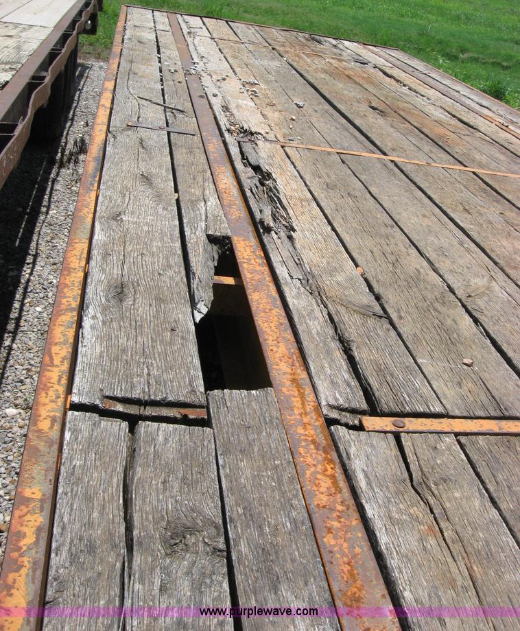 image for item 2124 1996 12 ton flat bed trailer