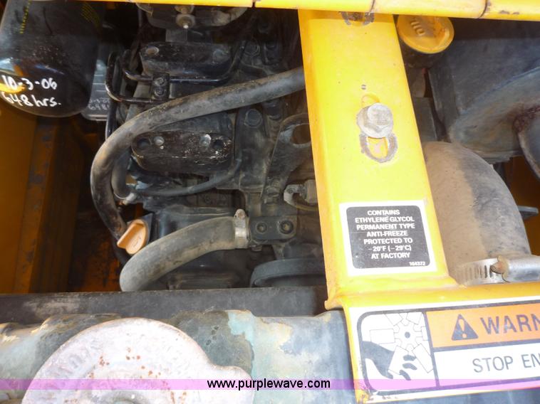 image for item 2156 1993 John Deere 675B skid steer