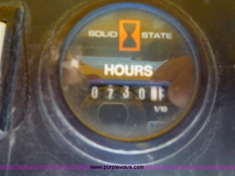 image for item 2156 1993 John Deere 675B skid steer